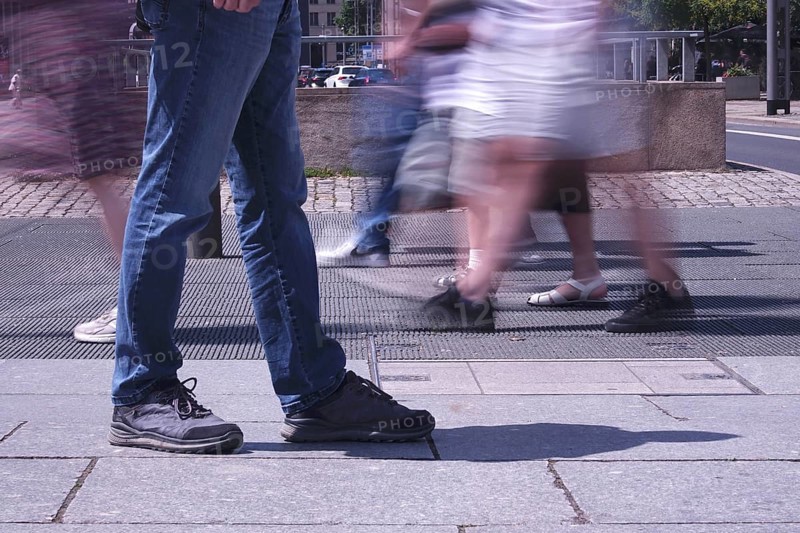 Passers-by in a summer city, shopping, Germany
