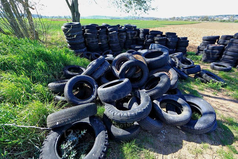 Old tyres in the landscape, car tyres
