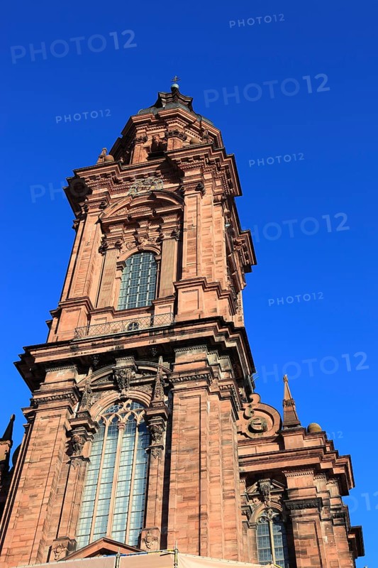 Tower of the new church. Today the building is used as an assembly hall and banqueting hall of the Julius Maximilian University, Würzburg, Lower Franconia, Bavaria, Germany