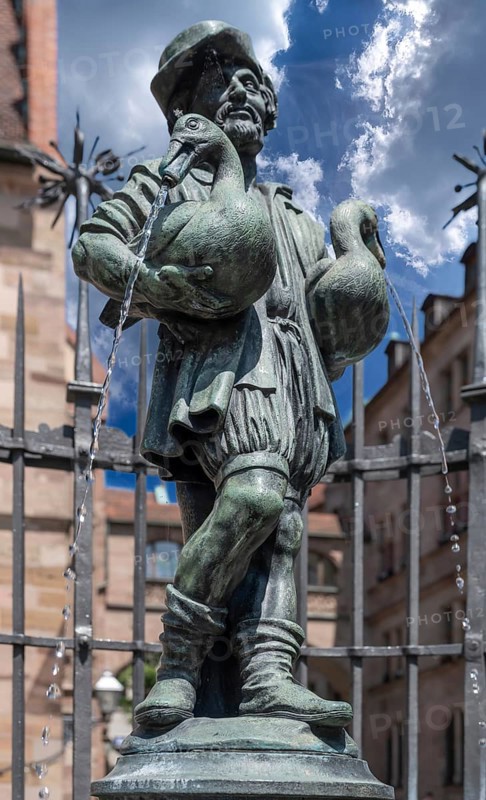 Goose-man fountain, created by the ore caster Pankraz Labenwolf around 1550, Rathausplatz, Nuremberg, Middle Franconia, Bavaria, Germany