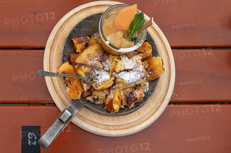 Kaiserschmarrn with apple sauce served in a small pan, Franconia, Bavaria, Germany