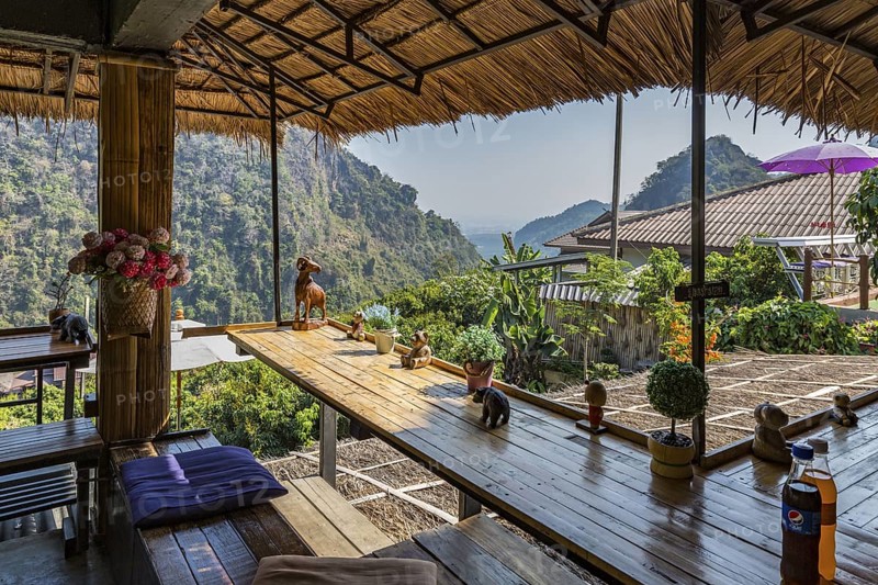 Stairs lead down to the Doi Phamee coffee shop and restaurant in Mae Sai district of Chiang Rai, Thailand