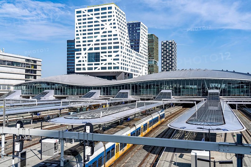 Utrecht Centraal railway station, tracks and concourse, trains of Nederlandse Spoorwegen N.V. state railway company, office building in the city centre, Netherlands