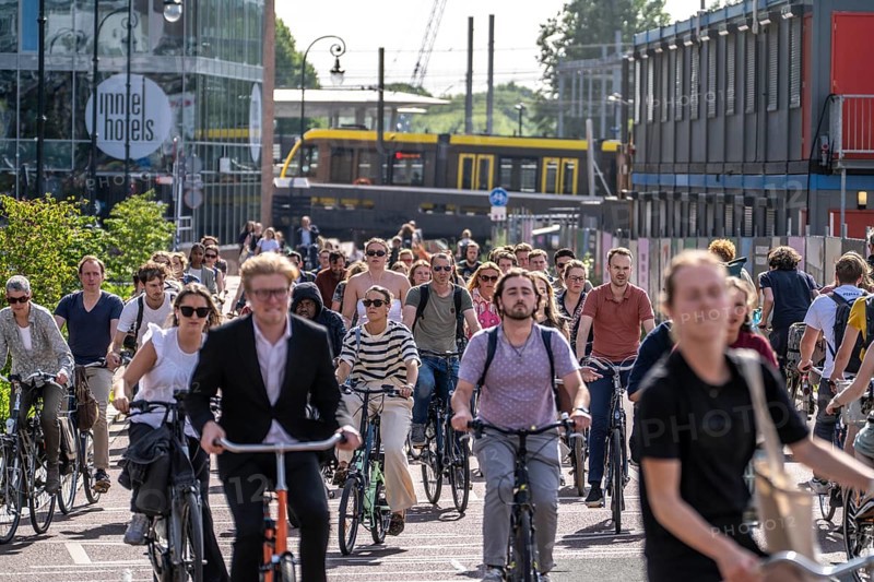 Central cycle path along the Vredenburg, behind the main station, Utrecht Centraal, in the city centre lanes for pedestrians, cyclists and local traffic are separated, dense traffic, no car/truck traffic, Utrecht, Netherlands