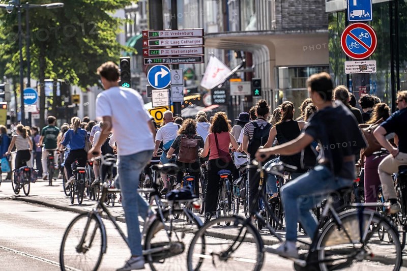 Central cycle path on the Lange Viestraat, lanes for pedestrians, cyclists and local traffic are separated in the city centre, dense traffic, no car/truck traffic, Utrecht, Netherlands