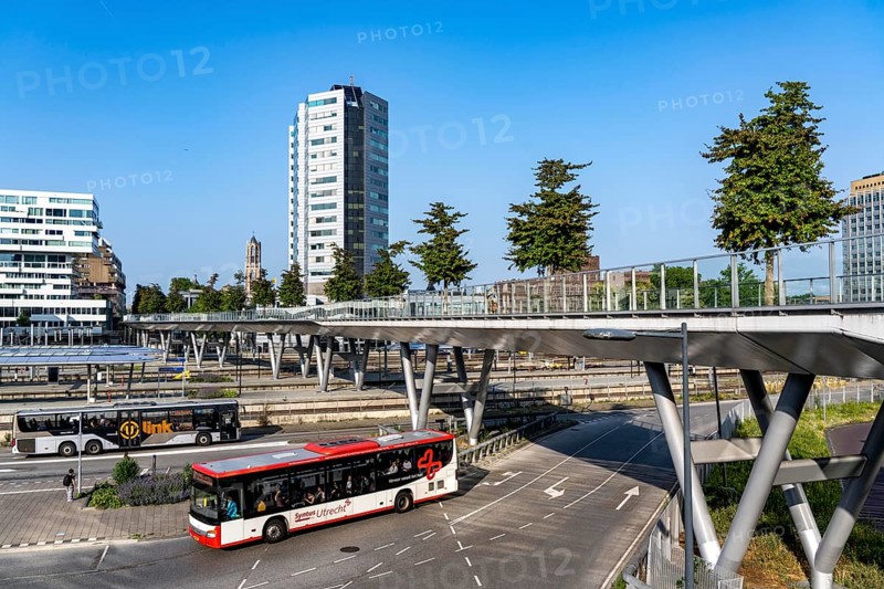 The Moreelsebrug, pedestrian and cycle bridge over the tracks of Utrecht Centraal, Central Station, Greened with trees, Netherlands