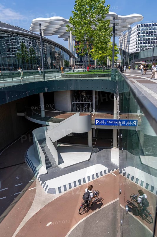 Entrance and exit to the central bicycle car park at Stationsplein, the largest bicycle car park in the world with over 13, 000 parking spaces on 3 floors, directly under the central station, Utrecht Centraal, Netherlands