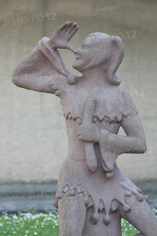 Sculpture of Till Eulenspiegel with gesture, thumb on nose, arm, high, up, hand, Bernburg, Saxony-Anhalt, Germany