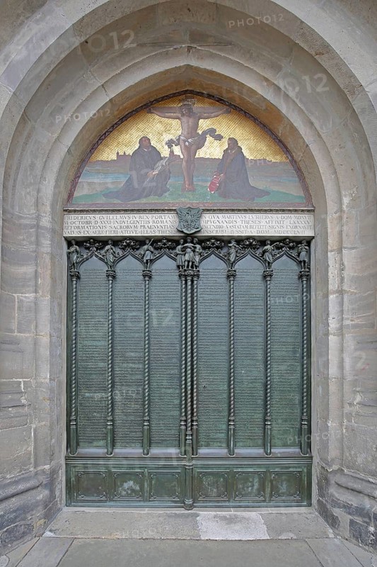 Thesis door and tympanum of the castle church with 95 theses published by Martin Luther on 30 October 1517, inscription, church door, mosaic, arts and crafts, Reformation, date, historical year, UNESCO, famous, castle church, castle, Luther city Wittenberg, Fläming, Saxony-Anhalt, Germany