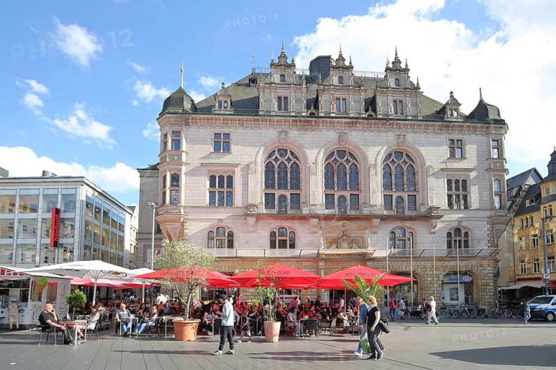 Neo-Gothic town house and street pub, with people and pedestrians, pedestrian zone, market square, Halle an der Saale, Saxony-Anhalt, Germany