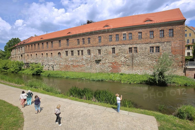 New Residence built in 1531 with bank of the millrace, pedestrian, photograph, Renaissance, Halle an der Saale, Saxony-Anhalt, Germany