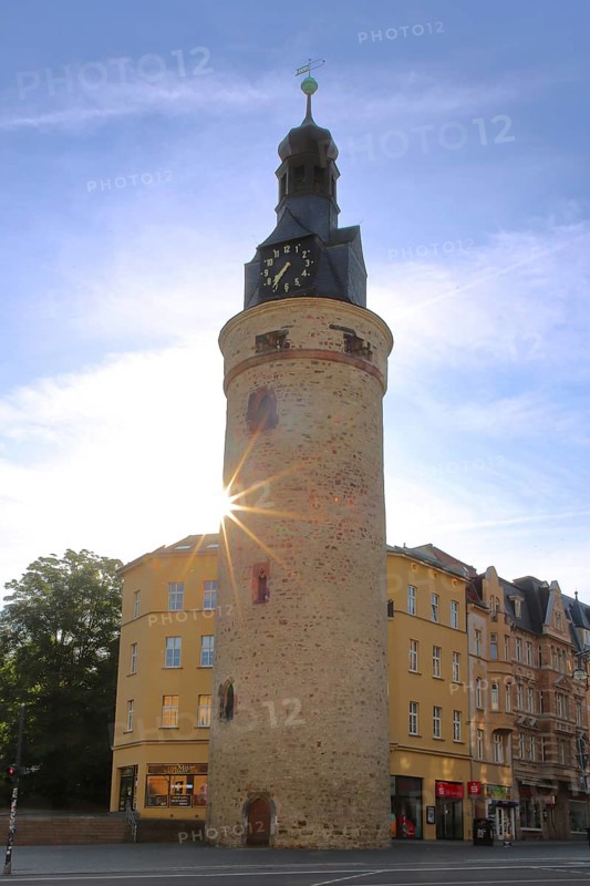 Historic Leipzig Tower built in the 15th century in backlight, sunbeams, former watchtower and part of the city fortifications, city tower, Halle an der Saale, Saxony-Anhalt, Germany