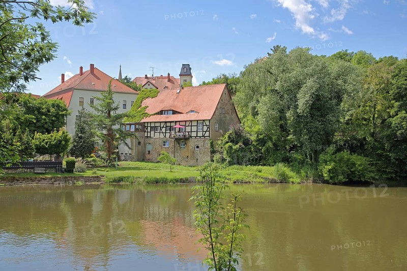 Saale river and historic half-timbered house Neumarktmühle, Saale valley, Merseburg, Saxony-Anhalt, Germany