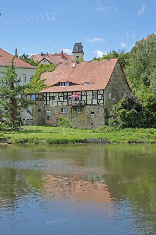 Saale river and historic half-timbered house Neumarktmühle, Saale valley, Merseburg, Saxony-Anhalt, Germany