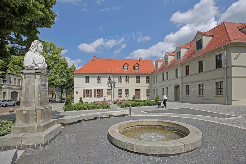 Bach monument, bust, Johann Sebastian Bach, sculpture, monument, fountains and houses, Bachplatz, Köthen, Saxony-Anhalt, Germany