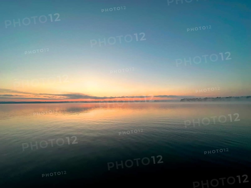 Evening mood, light fog over Lake Starnberg, Bavaria, Germany