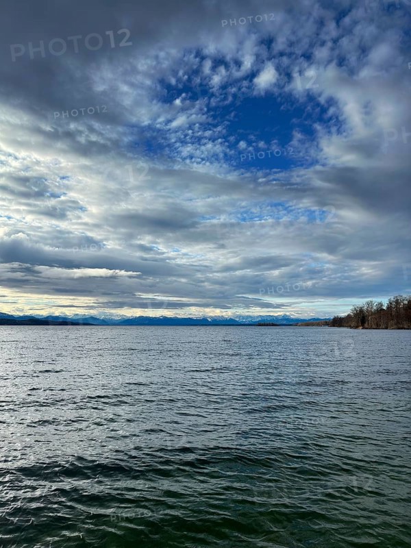 Lots of clouds over Lake Starnberg, Bavaria, Germany