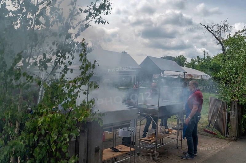 Heavy smoke at the sausage grill stations at the Backofenfest, Kleingeschaidt, Middle Franconia, Bavaria, Germany