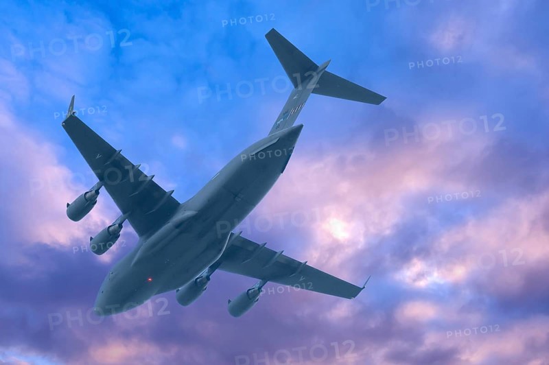 Boing C-17, strategic military transport aircraft of the US Air Force, cloudy sky, Bavaria, Germany