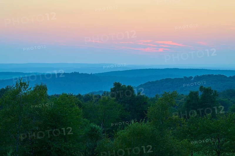 Pink evening sky over a gentle hilly landscape, peaceful nature, Geishöhe, Dammbach, Spessart, Bavaria, Germany