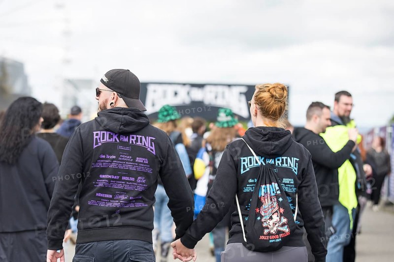 Two festival visitors with Rock am Ring jumpers at the Rock am Ring Festival on Friday, Nürburgring race track race track, 06.06.2025