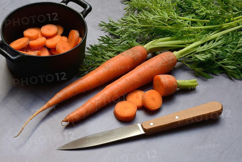 Carrots with leafy greens, carrot slices, Daucus carota