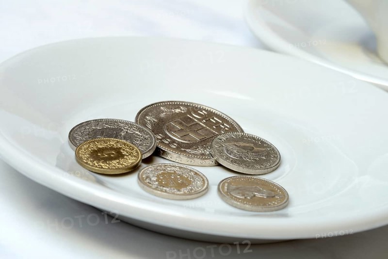 Tip, Swiss coins on plate, Switzerland