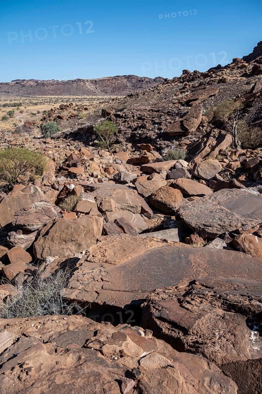 Barren landscape with red rocks, in a valley, Twyfelfontein, Kunene, Namibia