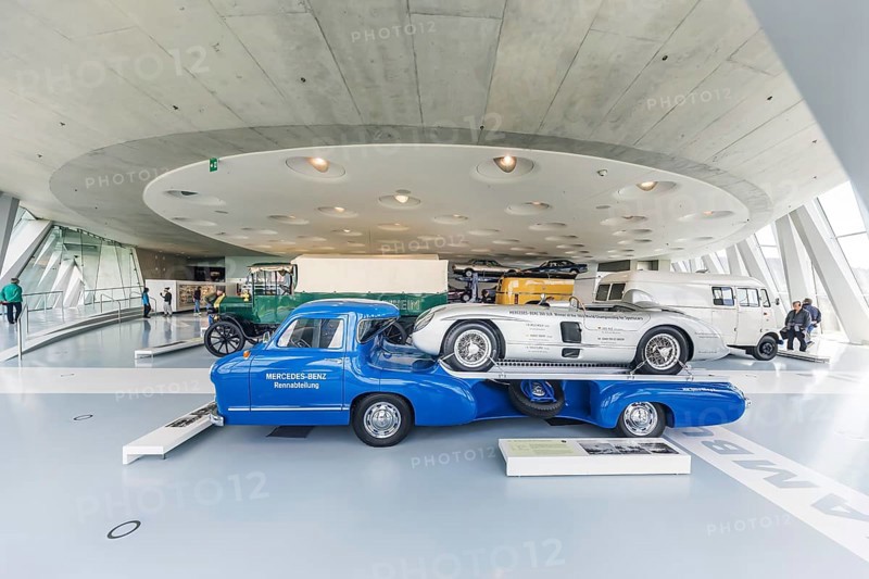 Mercedes-Benz racing car fast transporter from 1955 with 300 SLR racing car. The Mercedes-Benz Museum in Stuttgart presents a journey through the automotive history of the global corporation. The history of the Mercedes star begins with the first automobile in 1886. 160 vehicles are on display. Stuttgart, Baden-Württemberg, Germany
