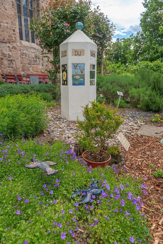 Church and Bible garden of St Crucis Church, Bad Sooden, Allendorf, Allendorf district, symbol of paradise garden with biblical flora, potted flowers, blossoms, art, Genesis Bible, Werra-Meissner district, Hesse, Germany