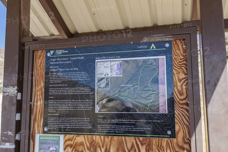 Sign at trailhead provides information for the Bar Canyon Trail in Organ Mountains - Desert Peaks National Monument in New Mexico, USA