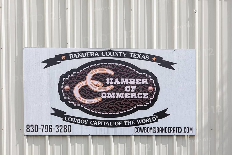 Sign for the Bandera County Chamber of Commerce in Bandera, Texas, USA