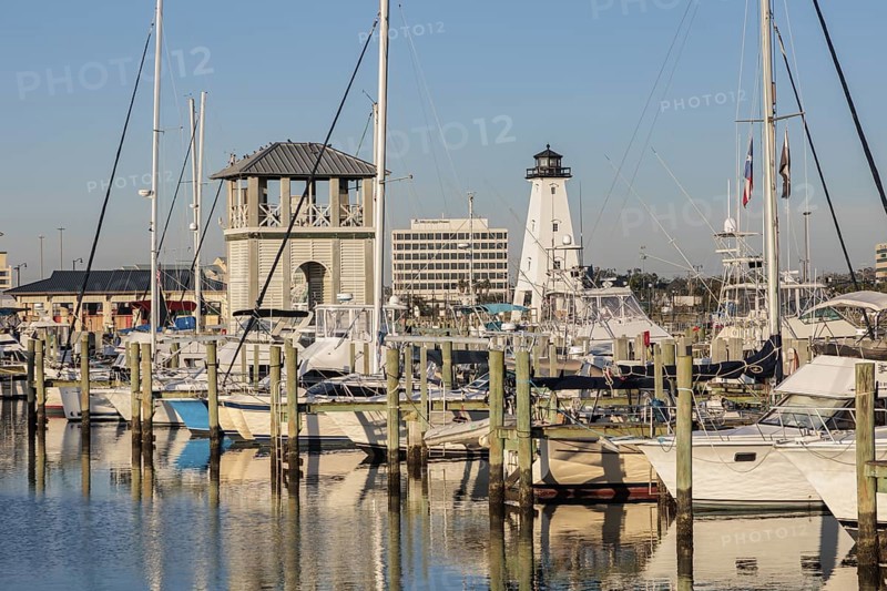Sailboats and fishing boats docked in the Small Craft Harbor at Gulfport, Mississippi, USA