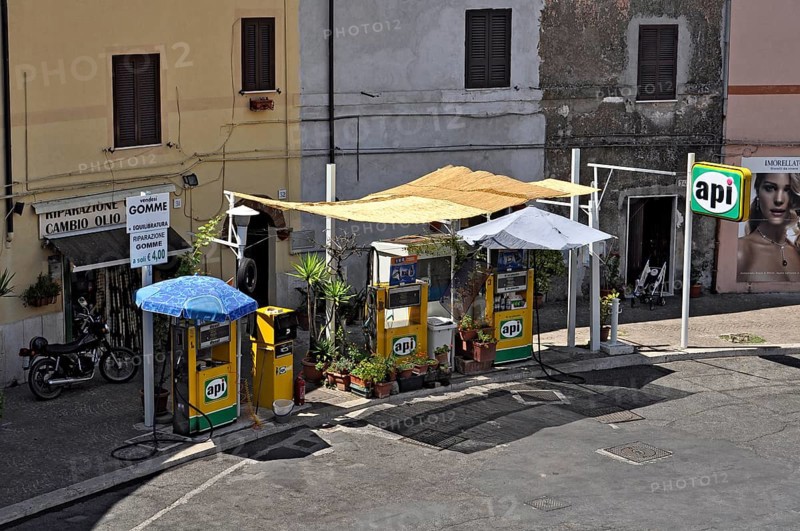 Small API petrol station with tyre workshop, Piazza Santa Maria, old town, Zagarolo, Alban Hills, metropolitan city of Rome, Lazio, Italy