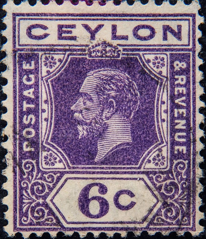 George V (1865 – 1936) was King of the United Kingdom and the British Dominions, and Emperor of India, from 6 May 1910 until his death in 1936. Portrait on av Ceylon, Sri Lanka post stamp