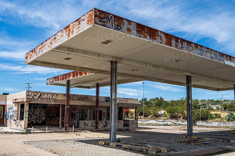 Ruins of a former gas station, now lost place, along road Ubeda-Baeza, Andalusia, Spain