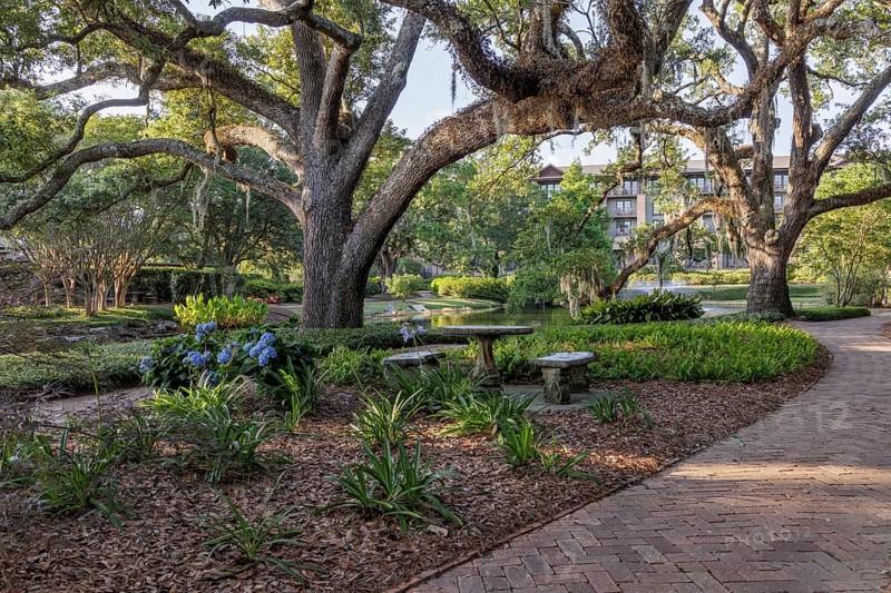Walkway through lush gardens at Grand Hotel in Point Clear, Alabama