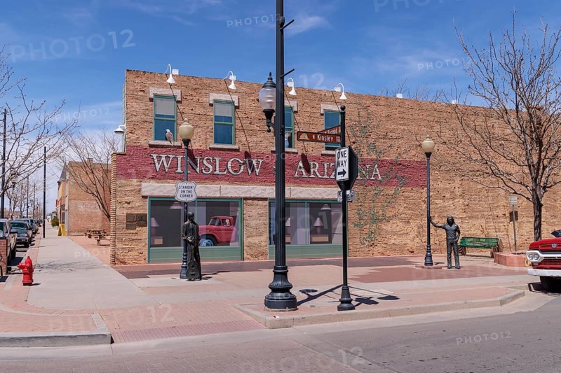 Statues of Glen Frey and a man Standin' on a Corner in Winslow Arizona as sung in the classic Glenn Frey and Jackson Browne song