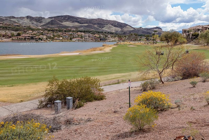 Colorful desert landscaping on a golf course along the shoreline of Las Vegas Wash at Lake Las Vegas in Henderson, Nevada, USA