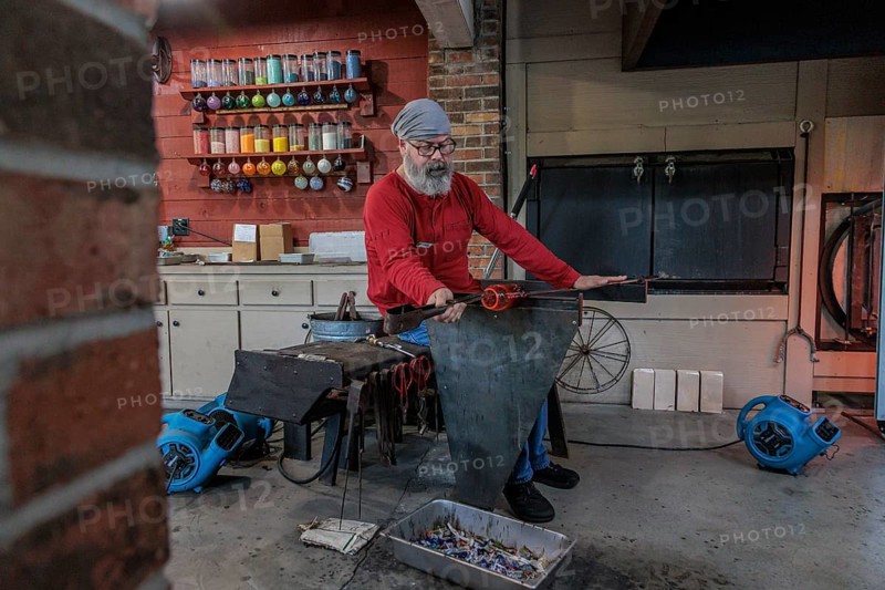 Glass blower demonstrates the art of blowing glass at the Dollywood amusement park in Pigeon Forge, TN