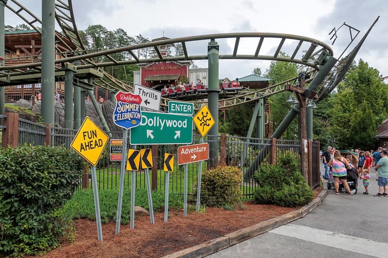 Road sign display for the Summer Celebrationin front of the FireChaser roller coaster ride in the Dollywood amusement park in Pigeon Forge, TN