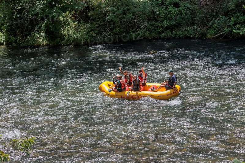 Rafters on the Nantahala River as seen from the Great Smoky Mountains Railroad which runs next to the river during its excursion from Bryson City, North Carolina