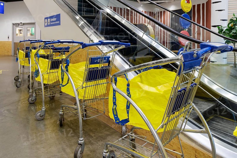 Shopping carts lined up at the entrance to the IKEA home store in Orlando, Florida