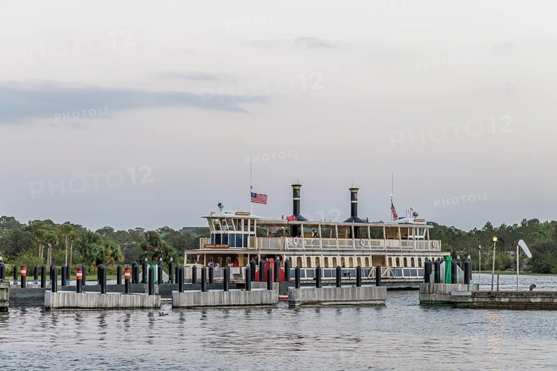 Water taxi General Joe Potter with passengers approaching the dock at the Magic Kingdom in Walt Disney World in Orlando, Florida, USA