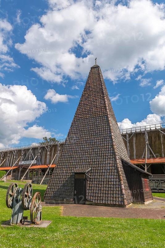 Drilling tower from 1864 for the development of a brine spring, 1000 years of salt production in Bad Sooden, Allendorf, district of Bad Sooden, deep well pump from 1920, town history, historical landmark graduation tower from 1638, wooden construction, 140 metres long, 12 metres high, open-air inhalatorium, blackthorn, brine air, aerosols, respiratory tract healing, therapy, white gold, brine, salt production process, blue sky, Werra-Meissner district, Hesse, Germany