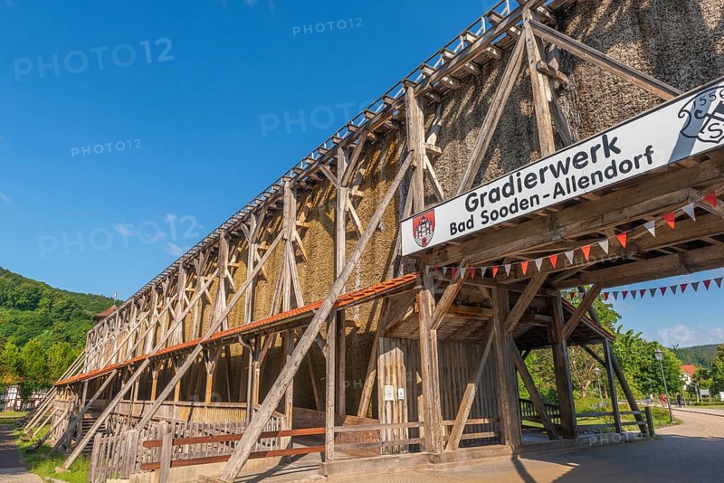 1000 years of salt production in Bad Sooden, Allendorf, district of Bad Sooden, town history, historical landmark graduation tower from 1638, wooden construction, 140 metres long, 12 metres high, open-air inhalatorium, blackthorn, brine air, aerosols, respiratory tract healing, therapy, white gold, brine, inscription, blue sky, Werra-Meissner district, Hesse, Germany