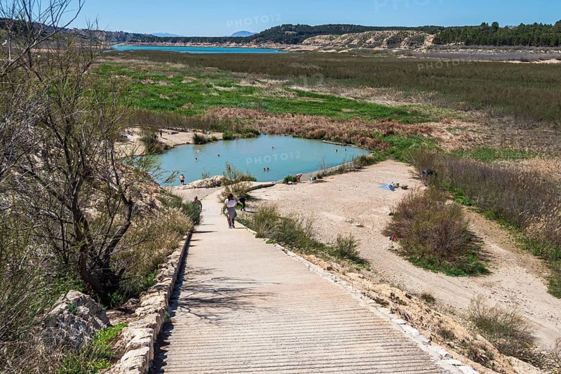 People take a bath, natural hot springs Banos de Zujar, near artificial lake Embalse de Negratin, Andalusia, Spain