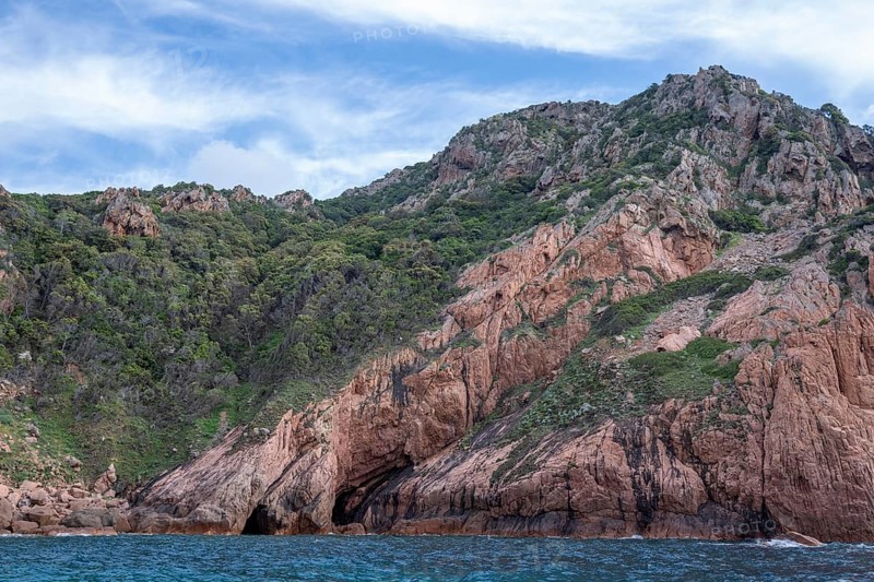 Rock formations and deep blue water, Capo Rosso, Gulf of Porto, Corsica, Corsica, France