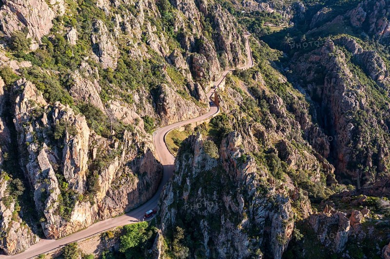 Road through bizarre rock formations, Calanche, Les Calanches de Piana, Gulf of Porto, Corse-du-Sud, Corsica