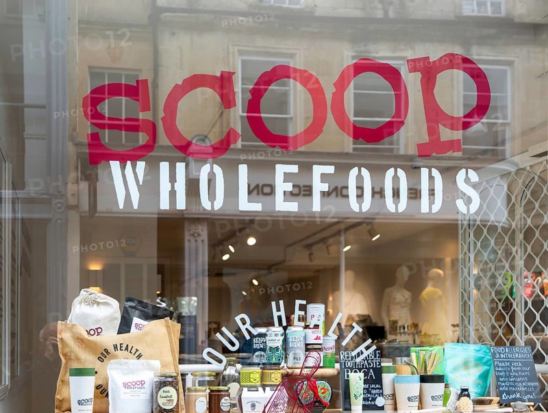 Scoop Wholefoods shop store window, Green Street, city of Bath, north east Somerset, England, UK